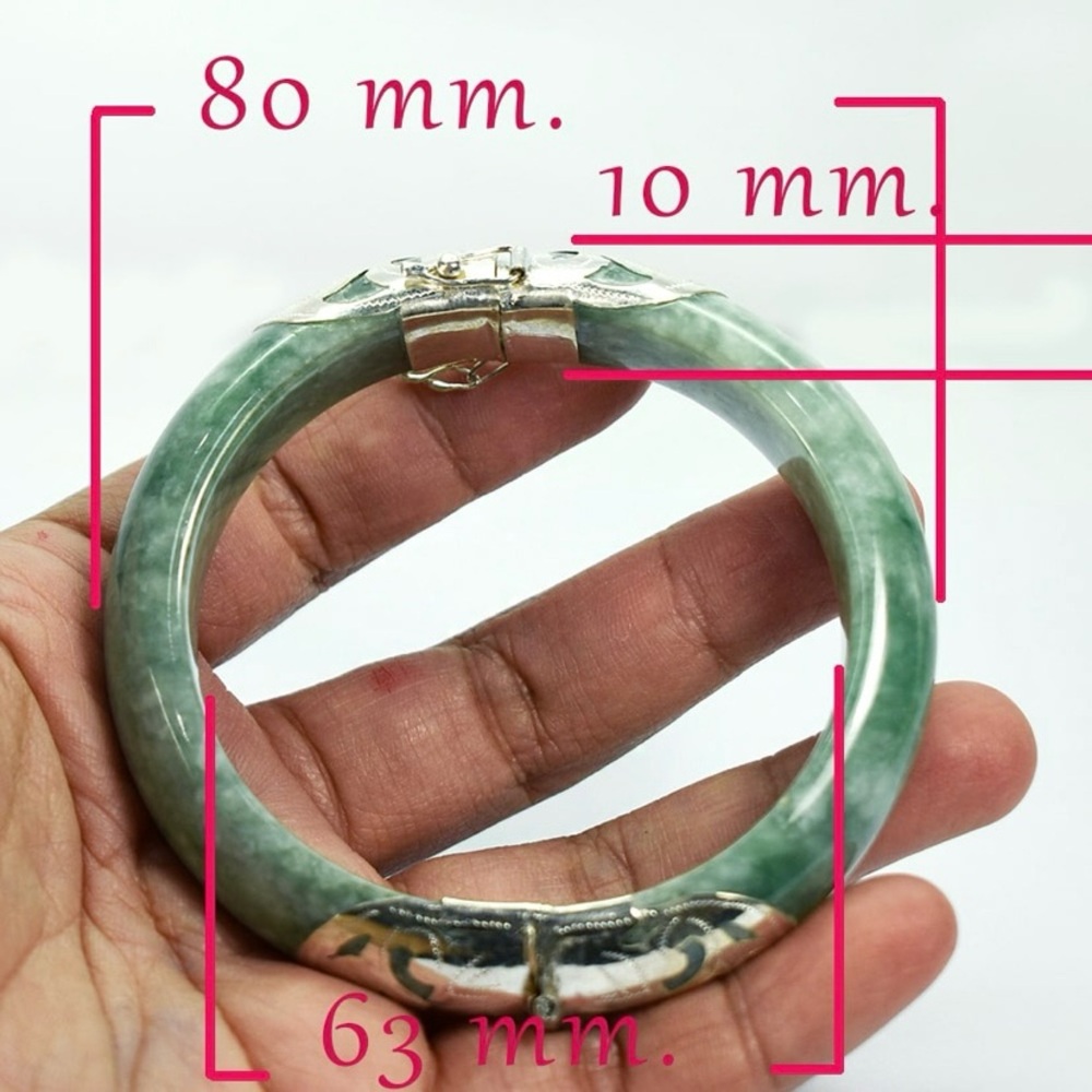 Natural Green Jade 430.92 Ct. Bangle Diameter 63 Mm. with Silver Trim